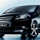 A photo of the Honda FR-V car in black.